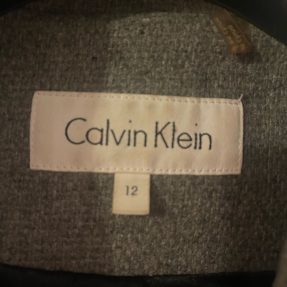 I am selling my gray kneelength Calvin Klein winter coat - Picture 2 of 5